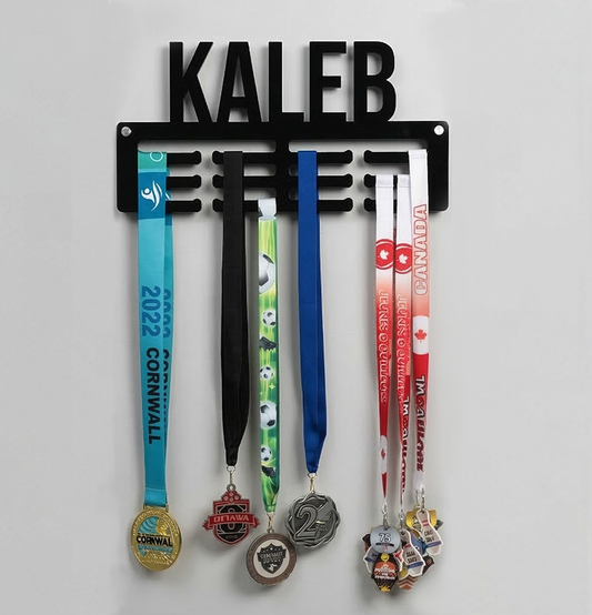 Medal holder with medals hanging on a gray background