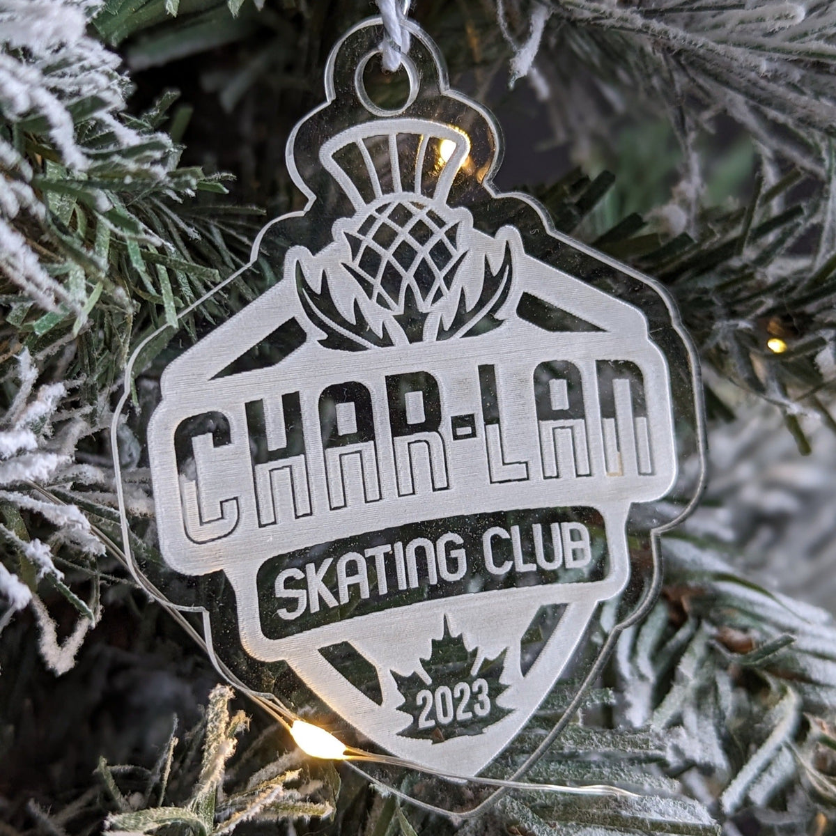 Custom printed acrylic crest ornament made for a skate club