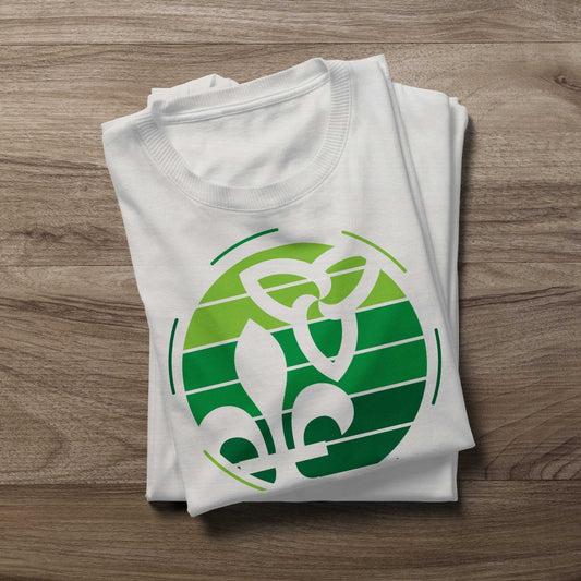 Folded Retro-Inspired Franco-Ontarien Shirt on a wooden background, featuring a design with the trillium and fleur-de-lys.