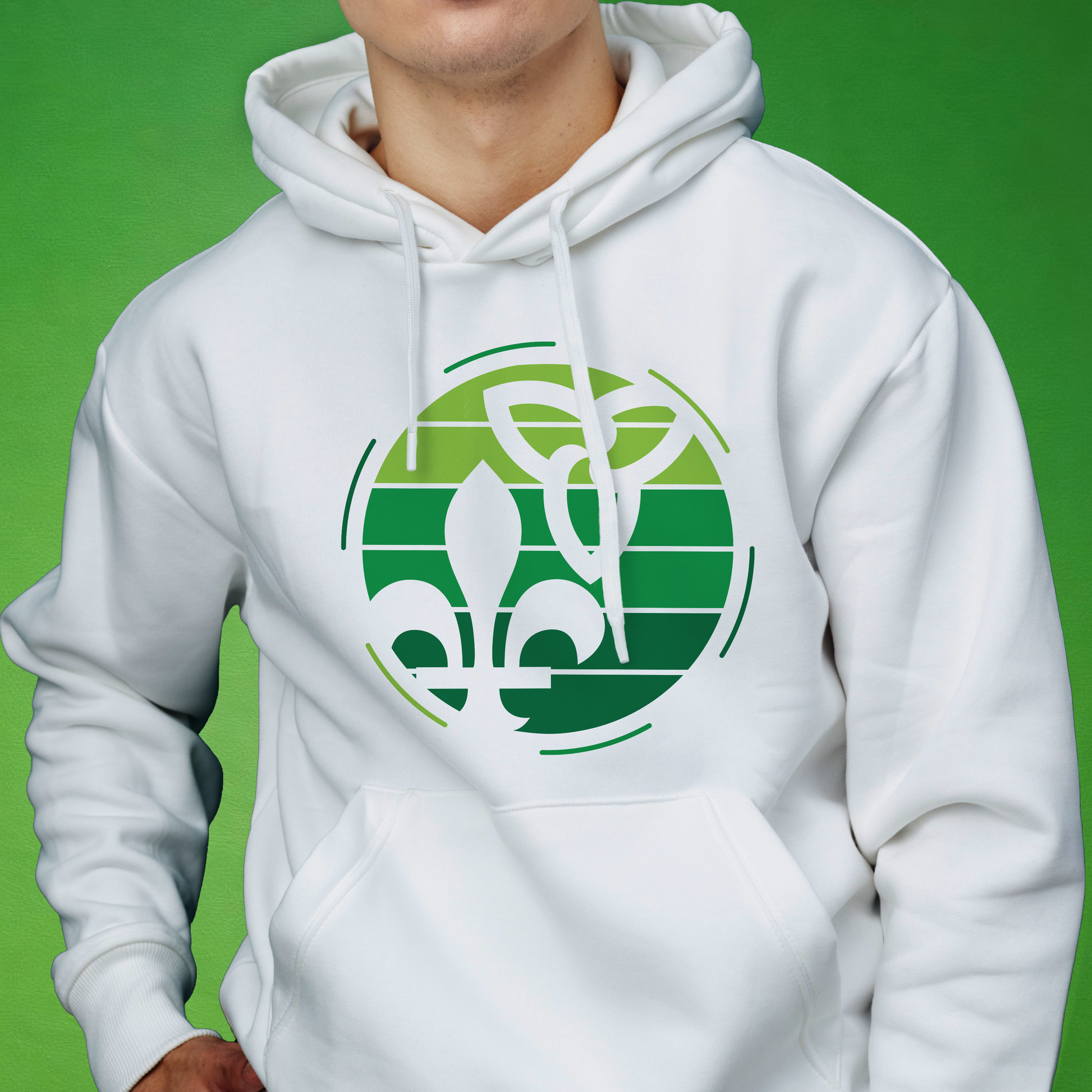 A white pullover hoodie with a green circular franco ontarien graphic on the chest, worn by a model against a solid green background.