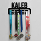 Medal holder with medals hanging on a gray background