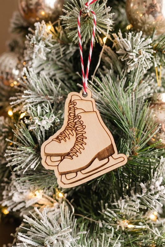 Engraved wooden figure skates ornament