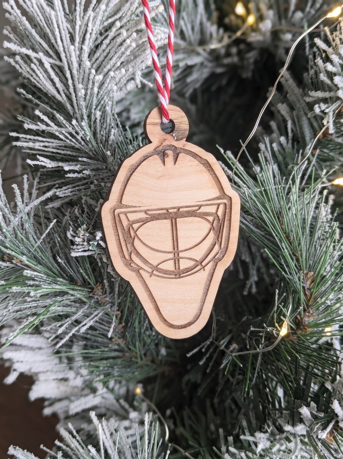 Engraved wooden hockey goalie mask ornament