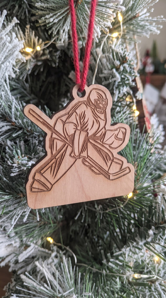 Engraved wooden hockey goalie player ornament