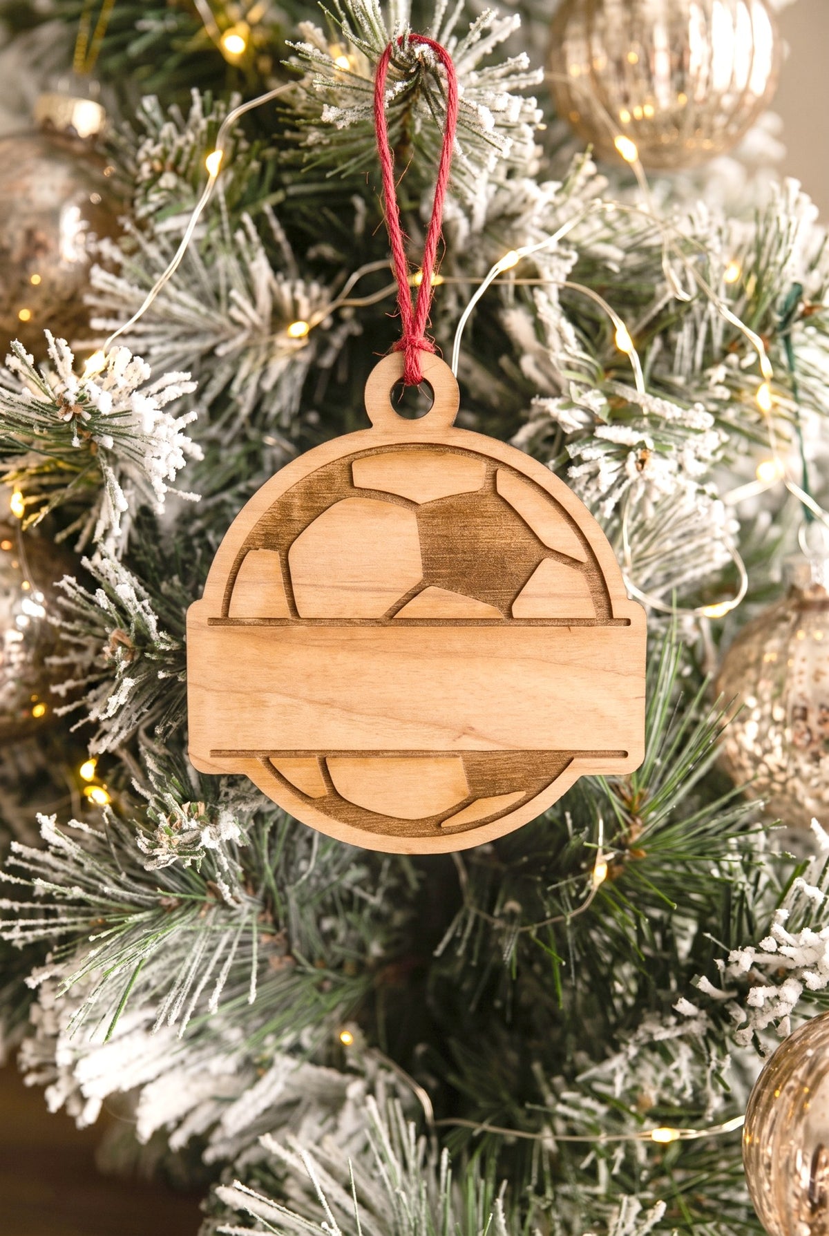 Engraved wooden soccer ball ornament with name banner