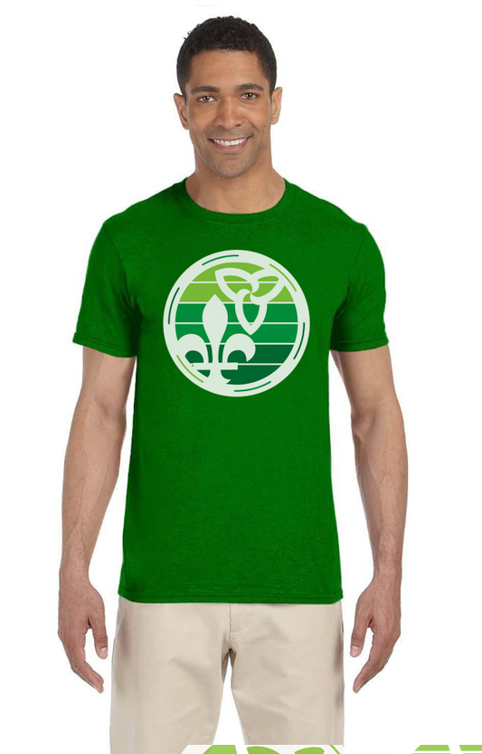 Smiling Black man wearing khakis and a retro inspired Franco-Ontarian shirt with the iconic trillium and fleur de lys, standing against a white background.
