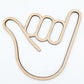 wooden cutout of a hand in the shaka sign position on white background